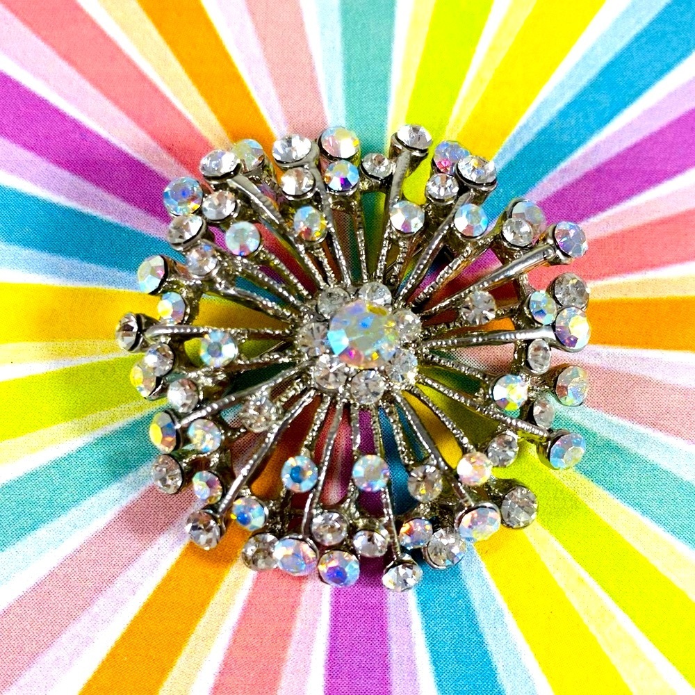 Stunning Aurora Borealis and silver tone starburst pin brooch